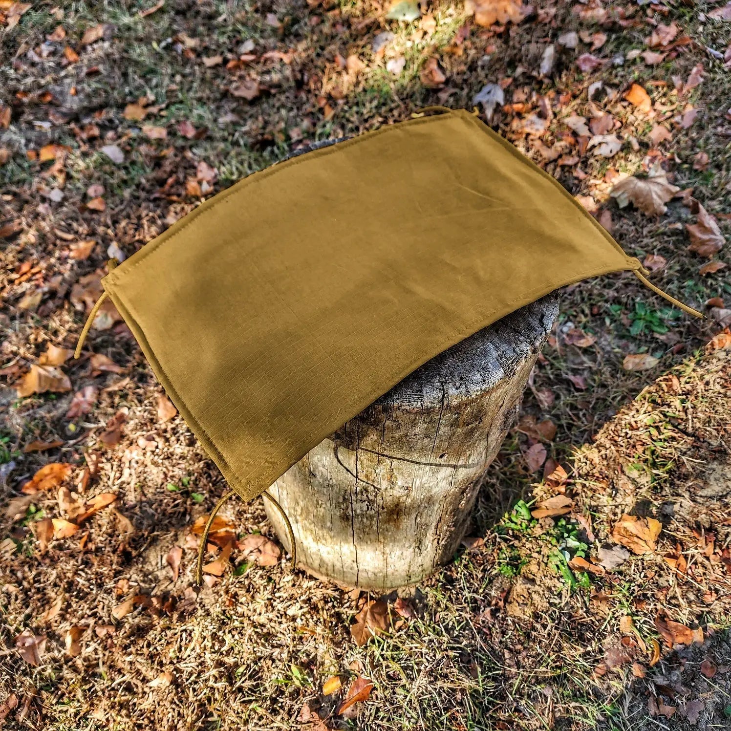 Woobie Hank: Insulated with USGI poncho-liner, serves as a large rag, knee pad, and adventure companion tool. Superesse Straps LLC