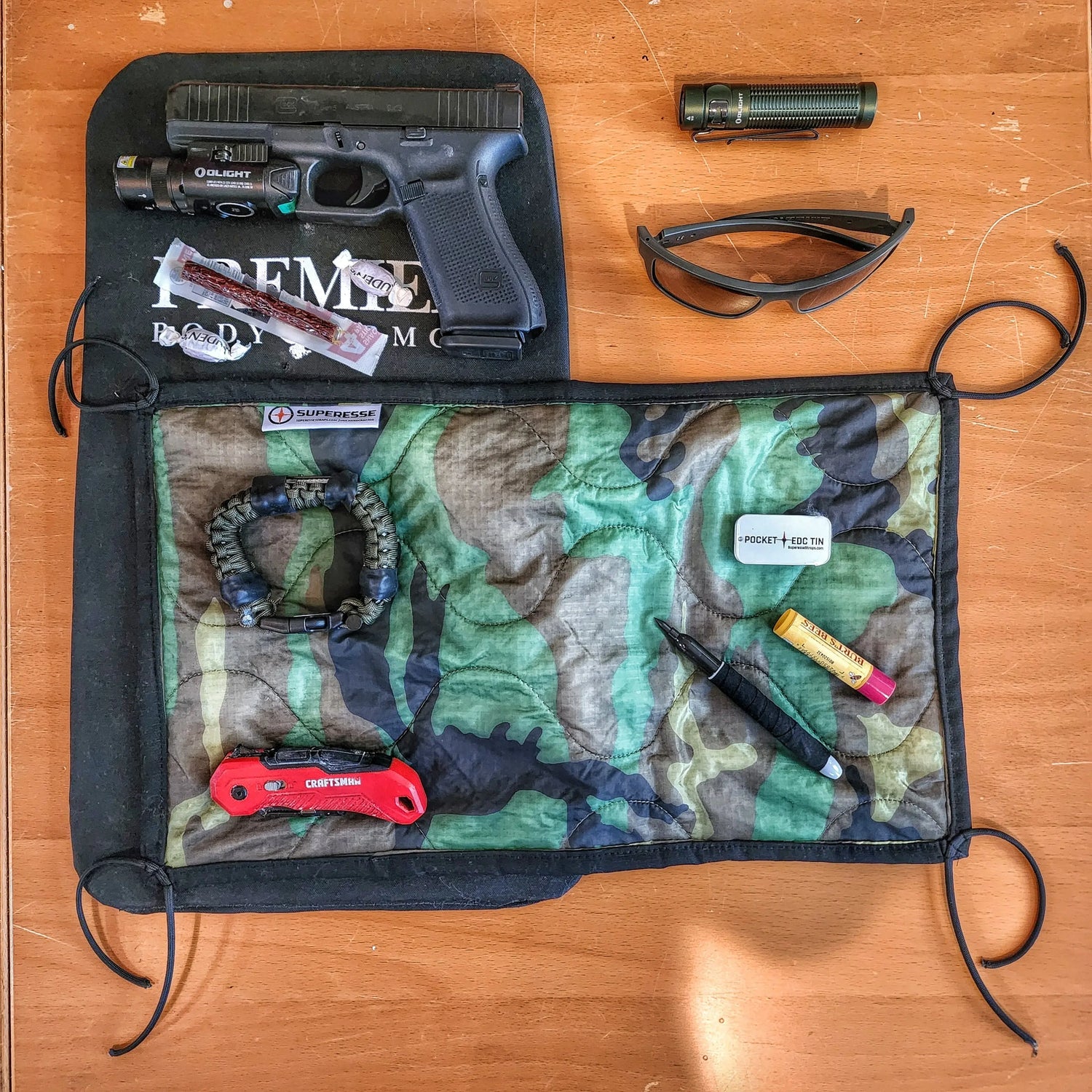 Woobie Hank: Insulated with USGI poncho-liner, serves as a large rag, knee pad, and adventure companion tool. Superesse Straps LLC