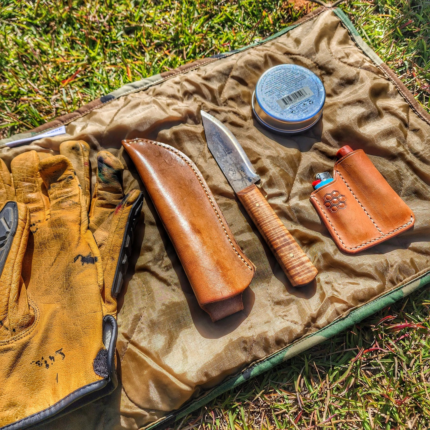 Woobie Hank: Insulated with USGI poncho-liner, serves as a large rag, knee pad, and adventure companion tool. Superesse Straps LLC