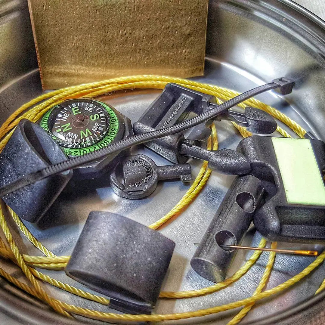 The Escape Evade Pathfinder: Military & Tactical Strap w/ SERE kit, Compass, Kevlar Saw, Cuff Key. Superesse Straps LLC