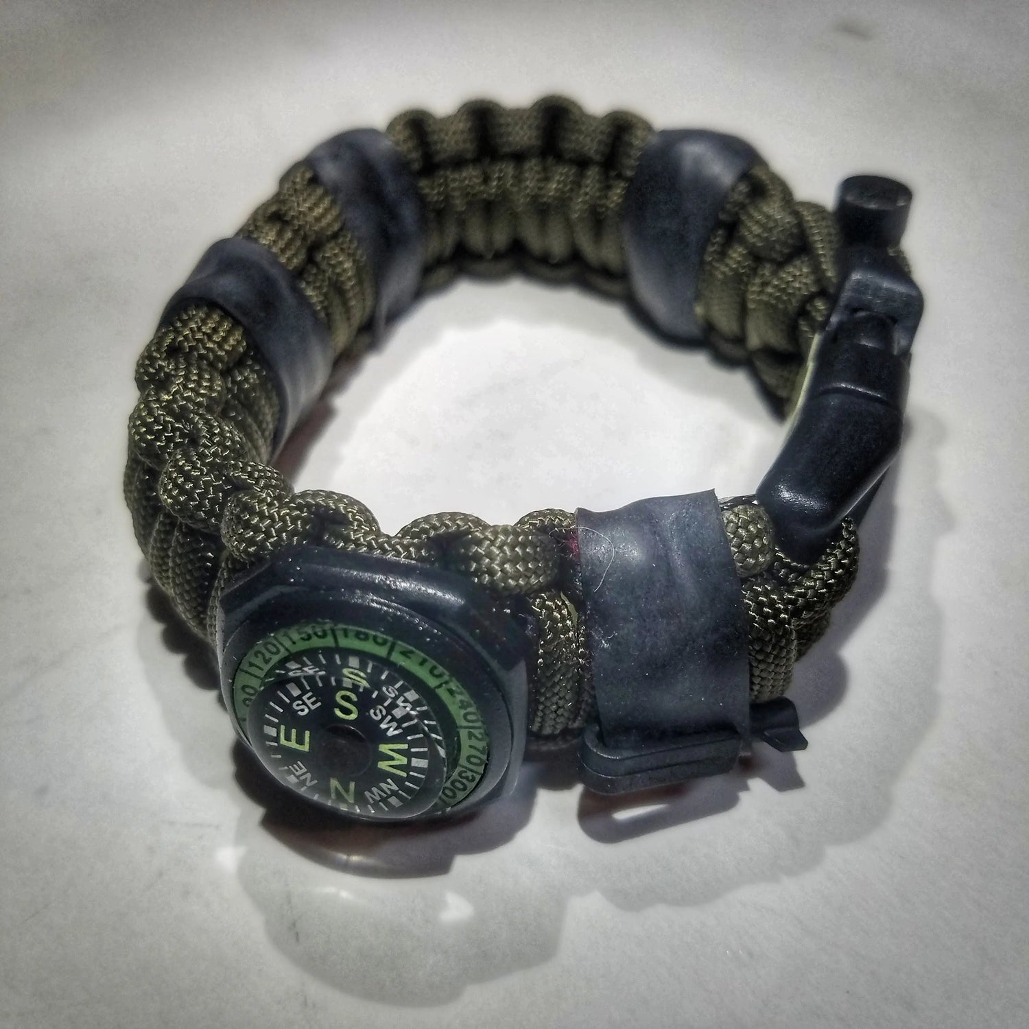 The Escape Evade Pathfinder: Military & Tactical Strap w/ SERE kit, Compass, Kevlar Saw, Cuff Key. Superesse Straps LLC