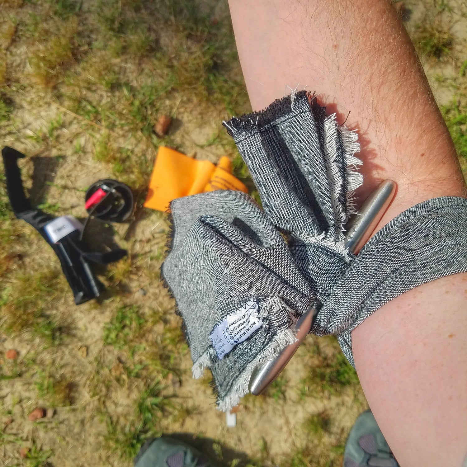 Saw Shemagh: Firestarter sewn button, built-in Kevlar Utility Saw, Fire Tinder border. Superesse Straps LLC