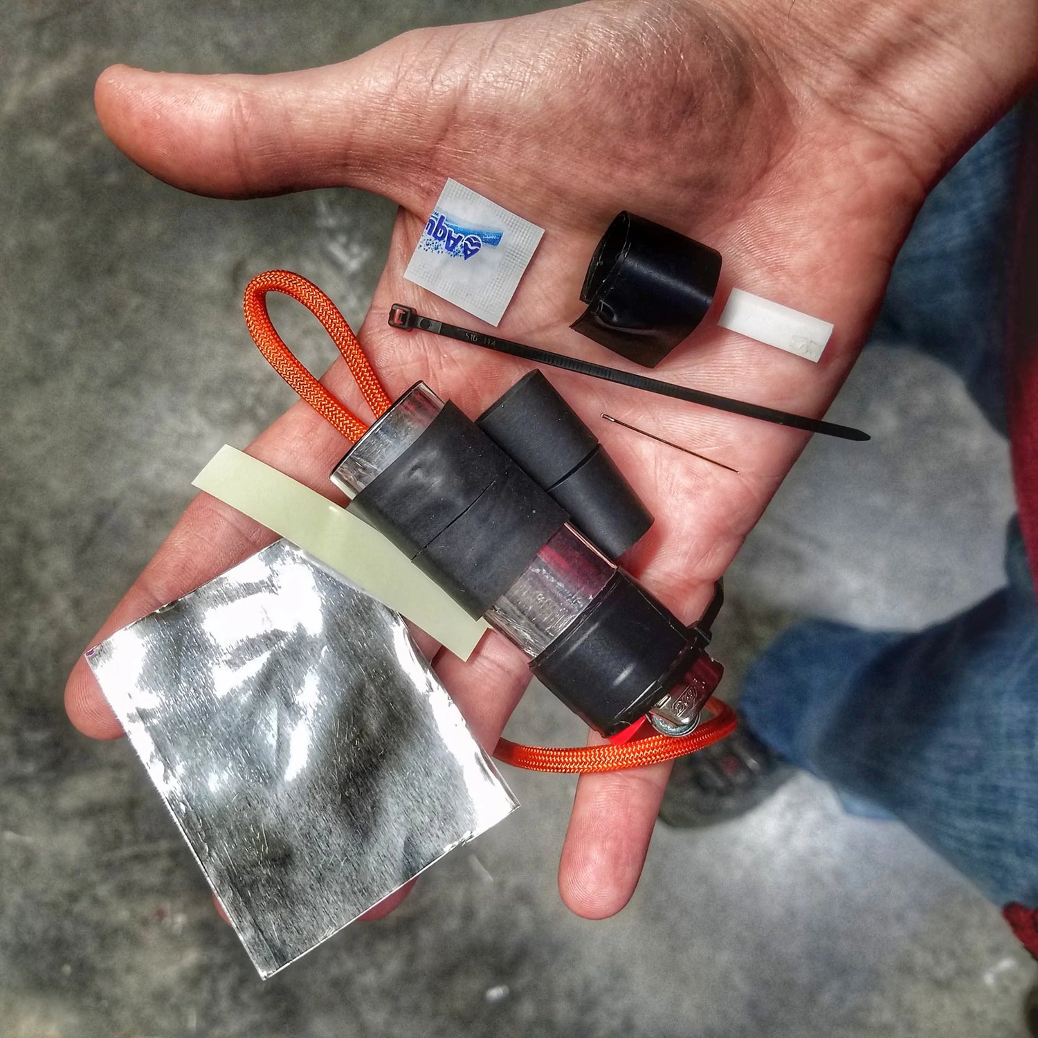 Survival Kit Lighter - Fire Starter outfitted with supplies. Superesse Straps LLC