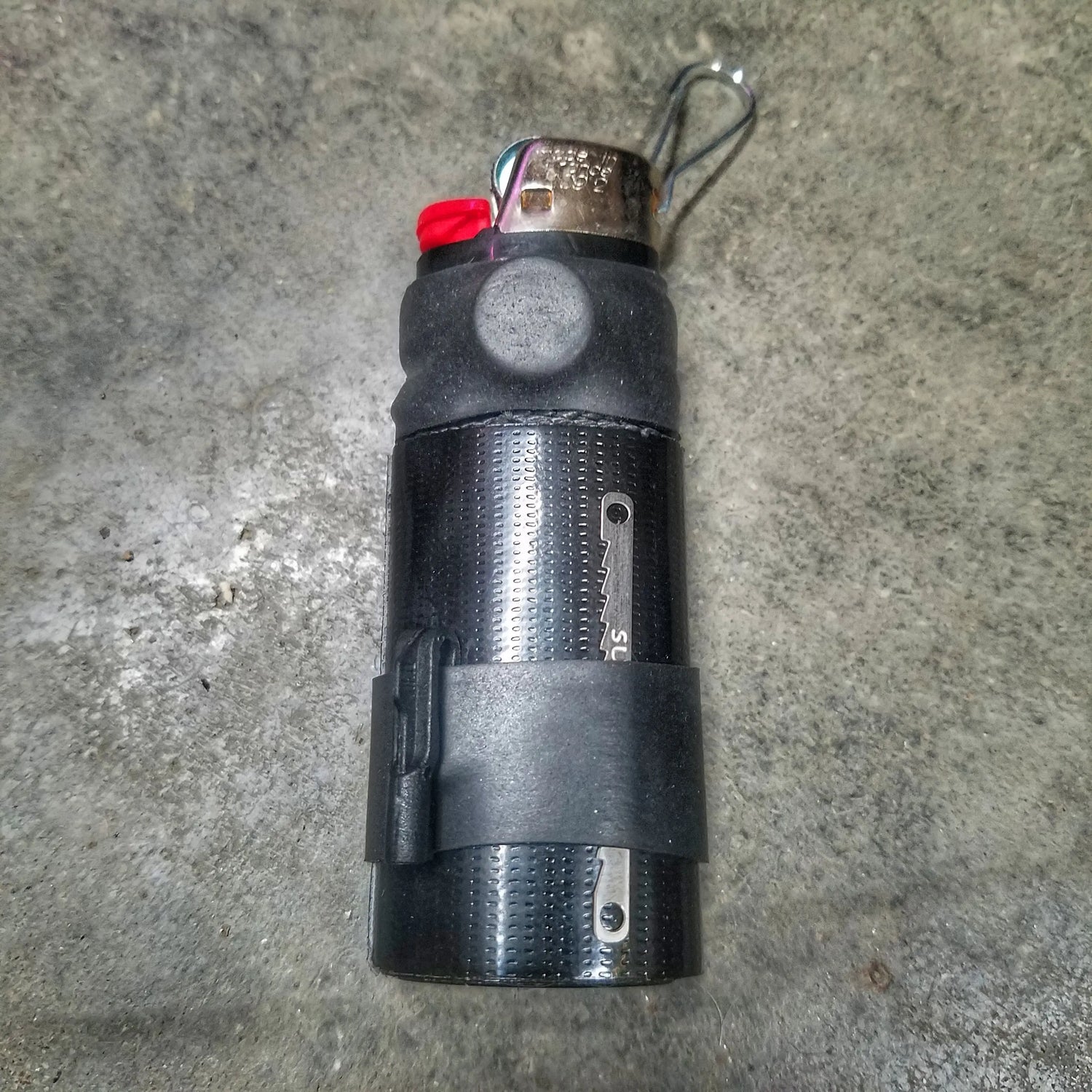 Survival Kit Lighter - Fire Starter outfitted with supplies. Superesse Straps LLC