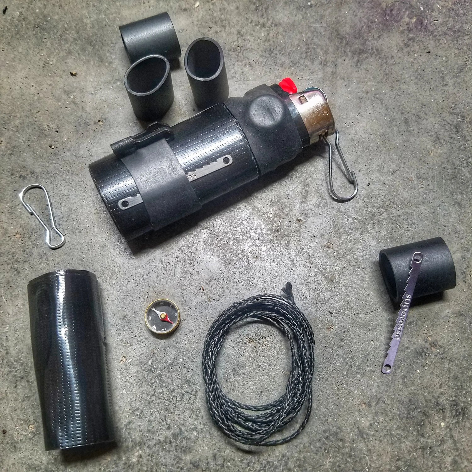 Survival Kit Lighter - Fire Starter outfitted with supplies. Superesse Straps LLC