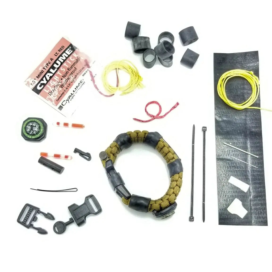 The Escape Evade Pathfinder: Military & Tactical Strap w/ SERE kit, Compass, Kevlar Saw, Cuff Key. Superesse Straps LLC