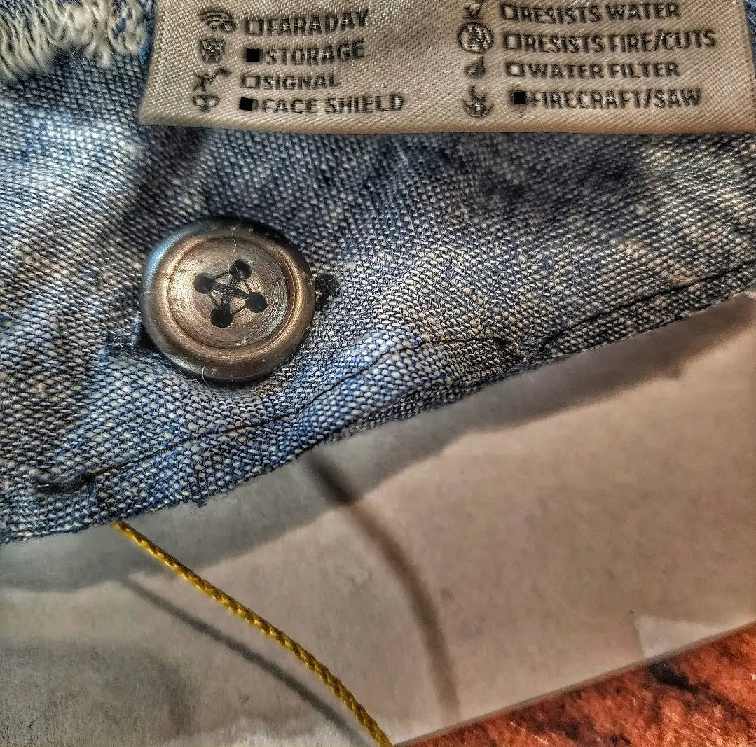 Saw Shemagh: Firestarter sewn button, built-in Kevlar Utility Saw, Fire Tinder border. Superesse Straps LLC