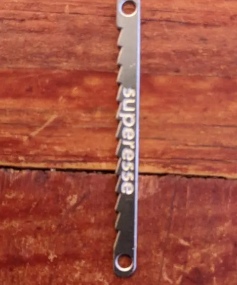 Saw Shim Tool - Custom built flexible steel escape shim with saw tooth edge (2 pack). Superesse Straps LLC