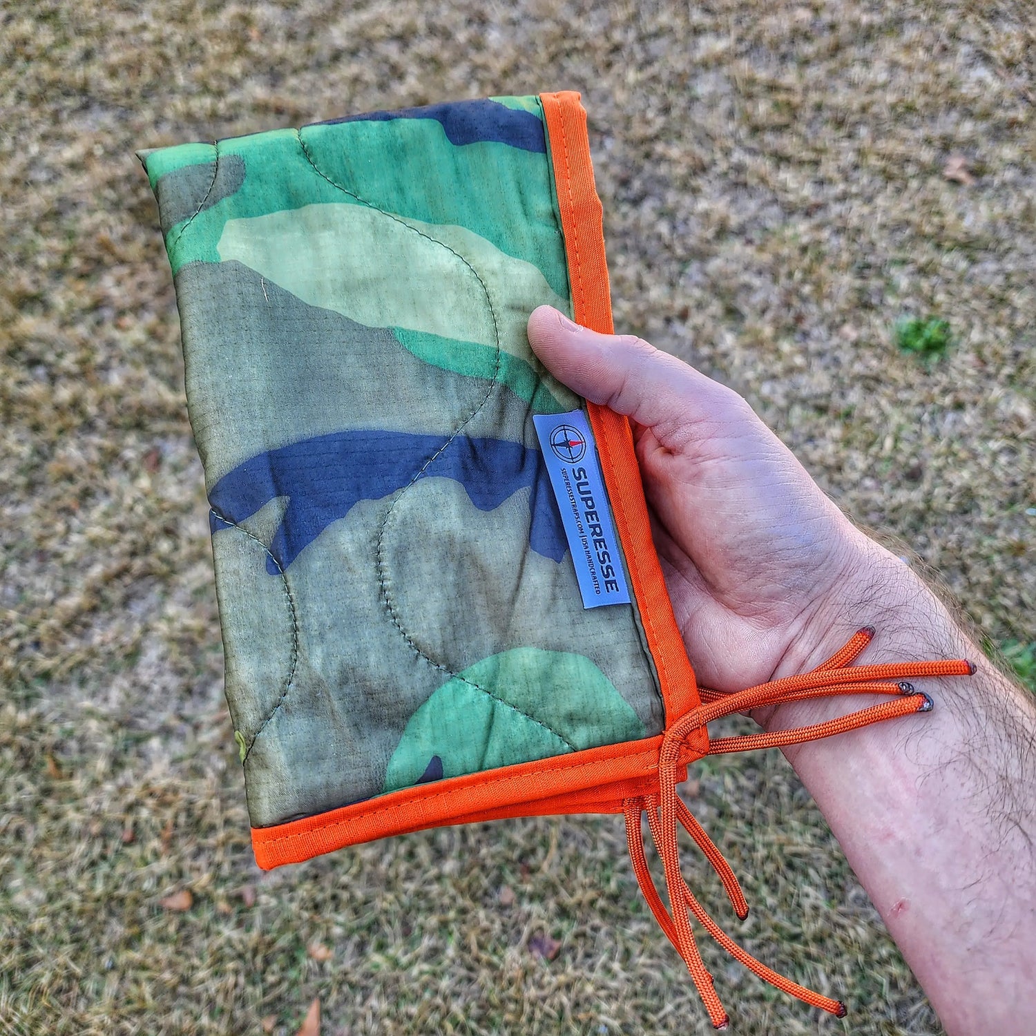 Woobie Hank: Insulated with USGI poncho-liner, serves as a large rag, knee pad, and adventure companion tool. Superesse Straps LLC