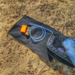 Woobie Hank: Insulated with USGI poncho-liner, serves as a large rag, knee pad, and adventure companion tool. Superesse Straps LLC