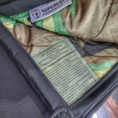 Woobie Hank: Insulated with USGI poncho-liner, serves as a large rag, knee pad, and adventure companion tool. Superesse Straps LLC