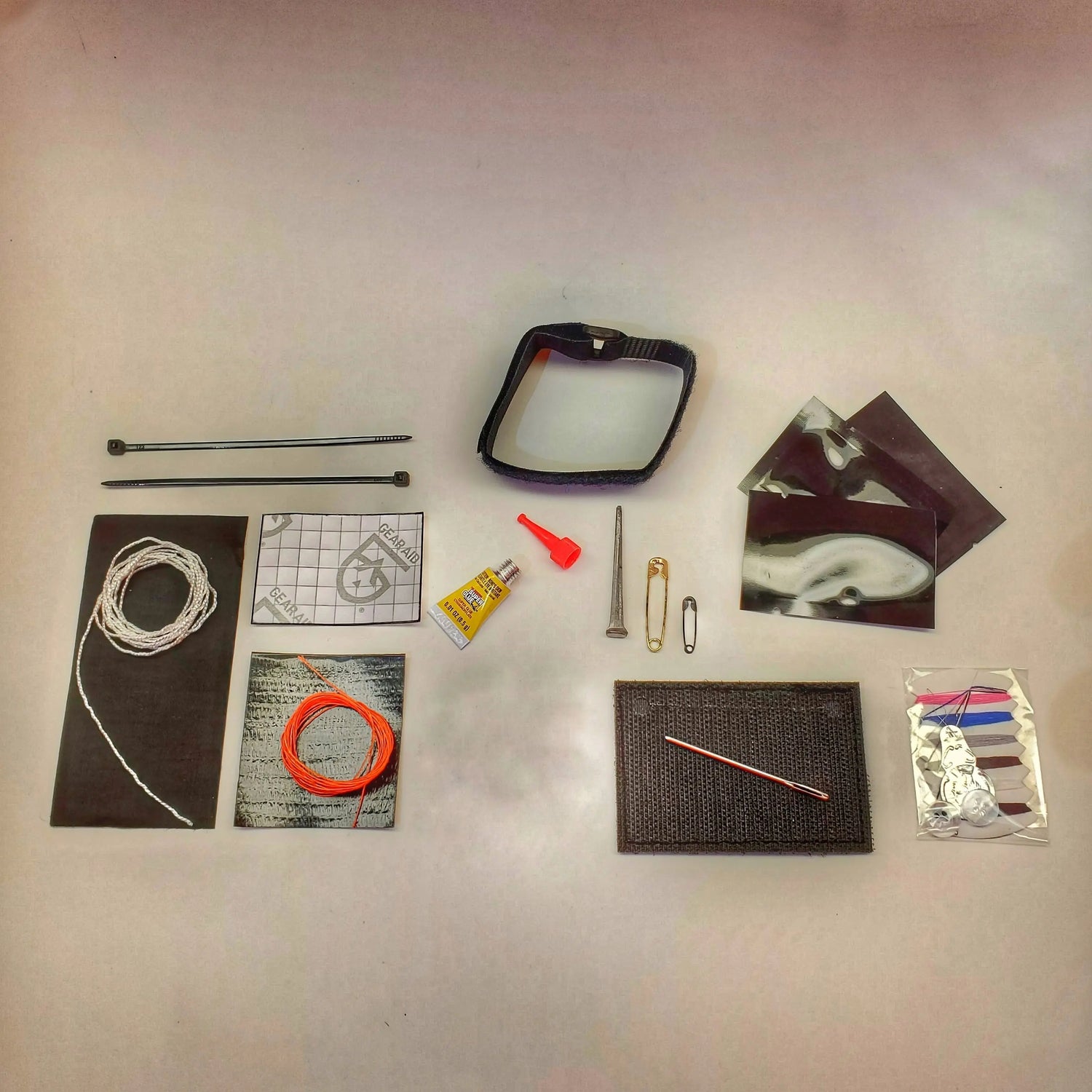 Field Repair Patch Kit - Fix broken items, stitch torn bags, parch tent rips, and seal holes. Superesse Straps LLC