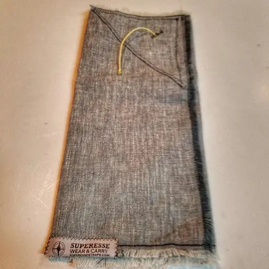 Saw Shemagh: Firestarter sewn button, built-in Kevlar Utility Saw, Fire Tinder border. Superesse Straps LLC