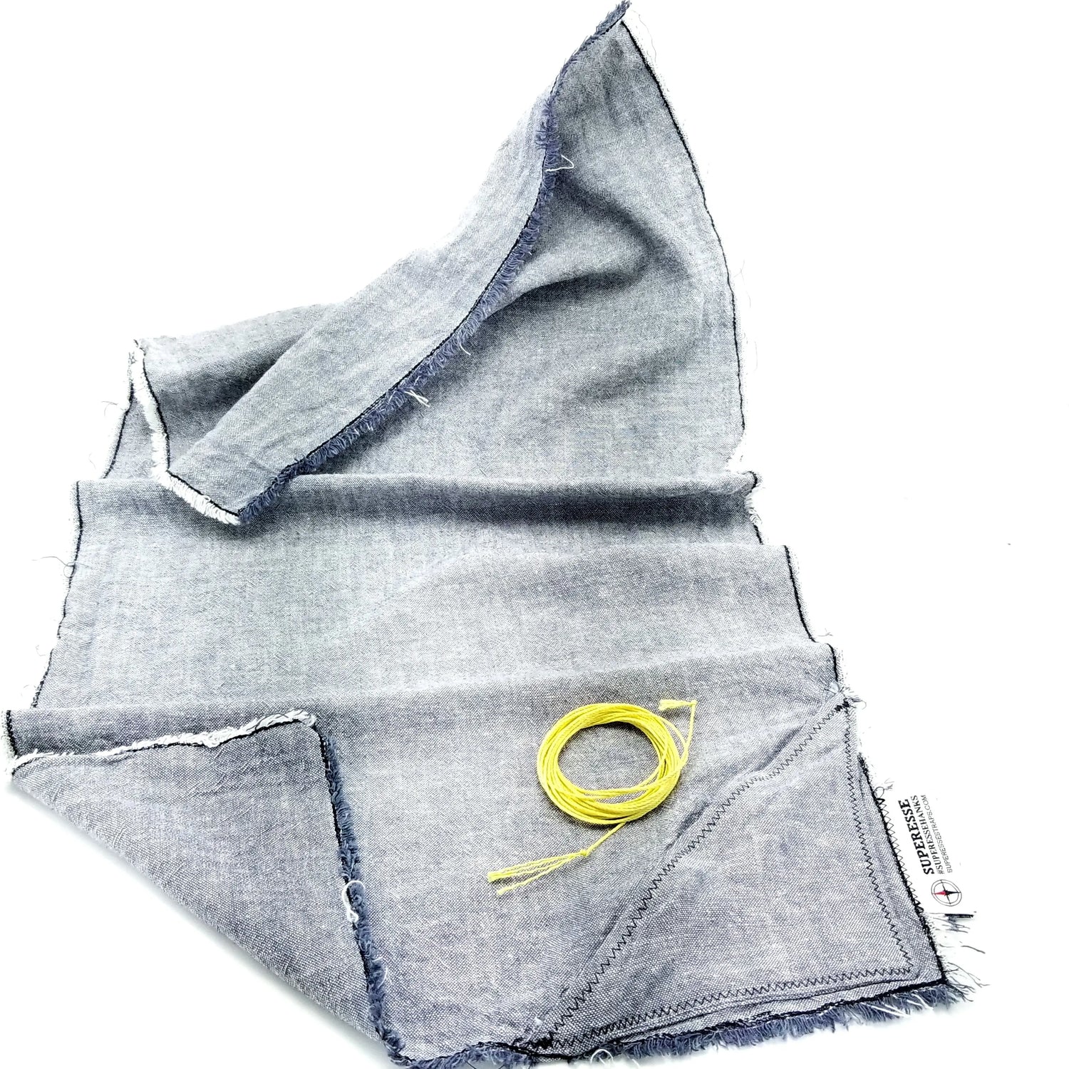 Saw Shemagh: Firestarter sewn button, built-in Kevlar Utility Saw, Fire Tinder border. Superesse Straps LLC