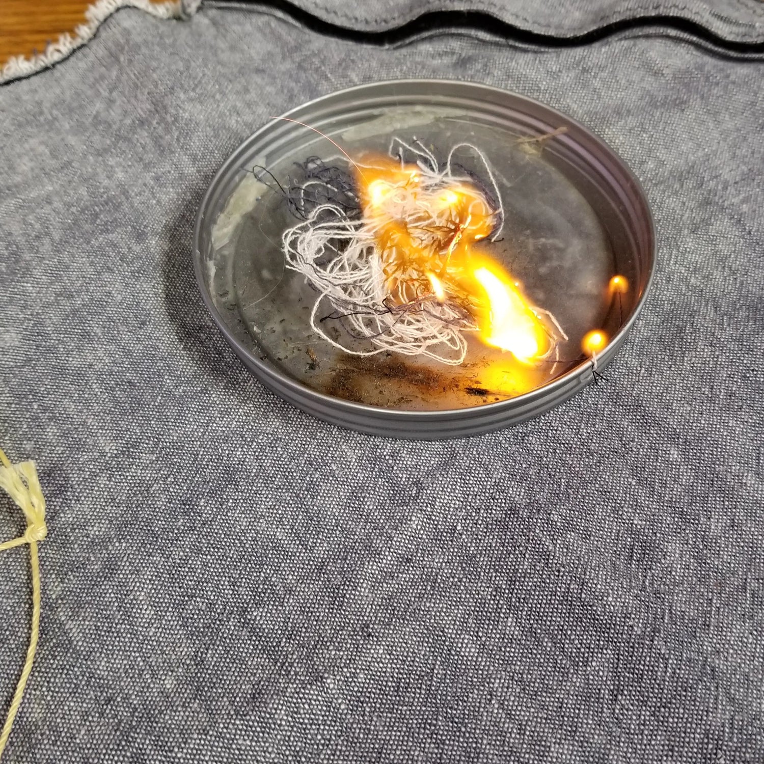 Saw Shemagh: Firestarter sewn button, built-in Kevlar Utility Saw, Fire Tinder border. Superesse Straps LLC