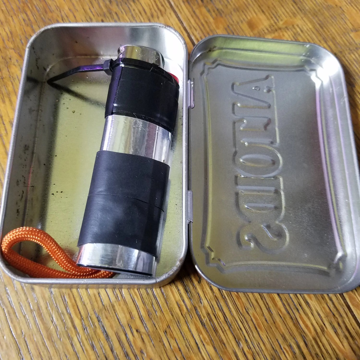 Survival Kit Lighter - Fire Starter outfitted with supplies. Superesse Straps LLC