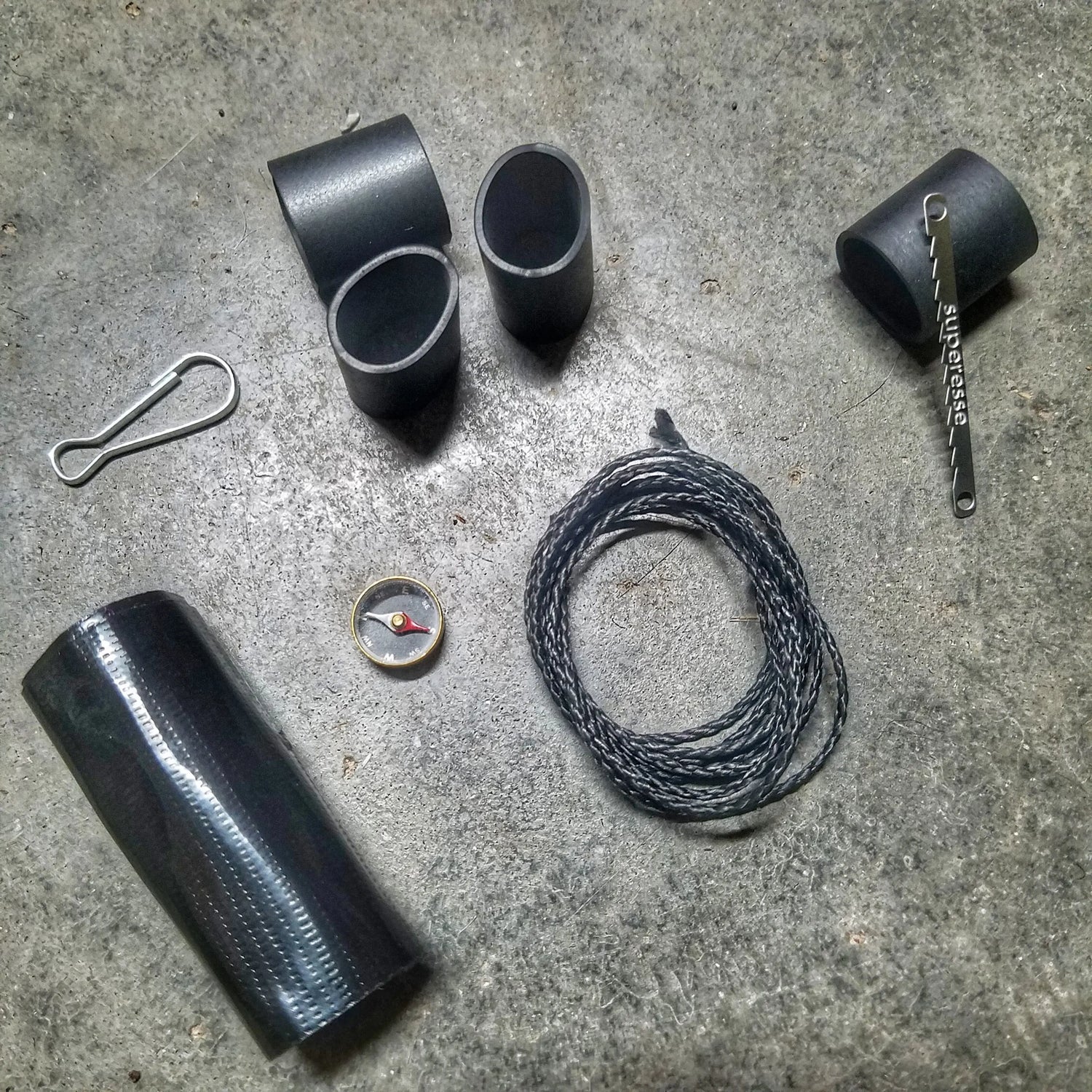 Survival Kit Lighter - Fire Starter outfitted with supplies. Superesse Straps LLC