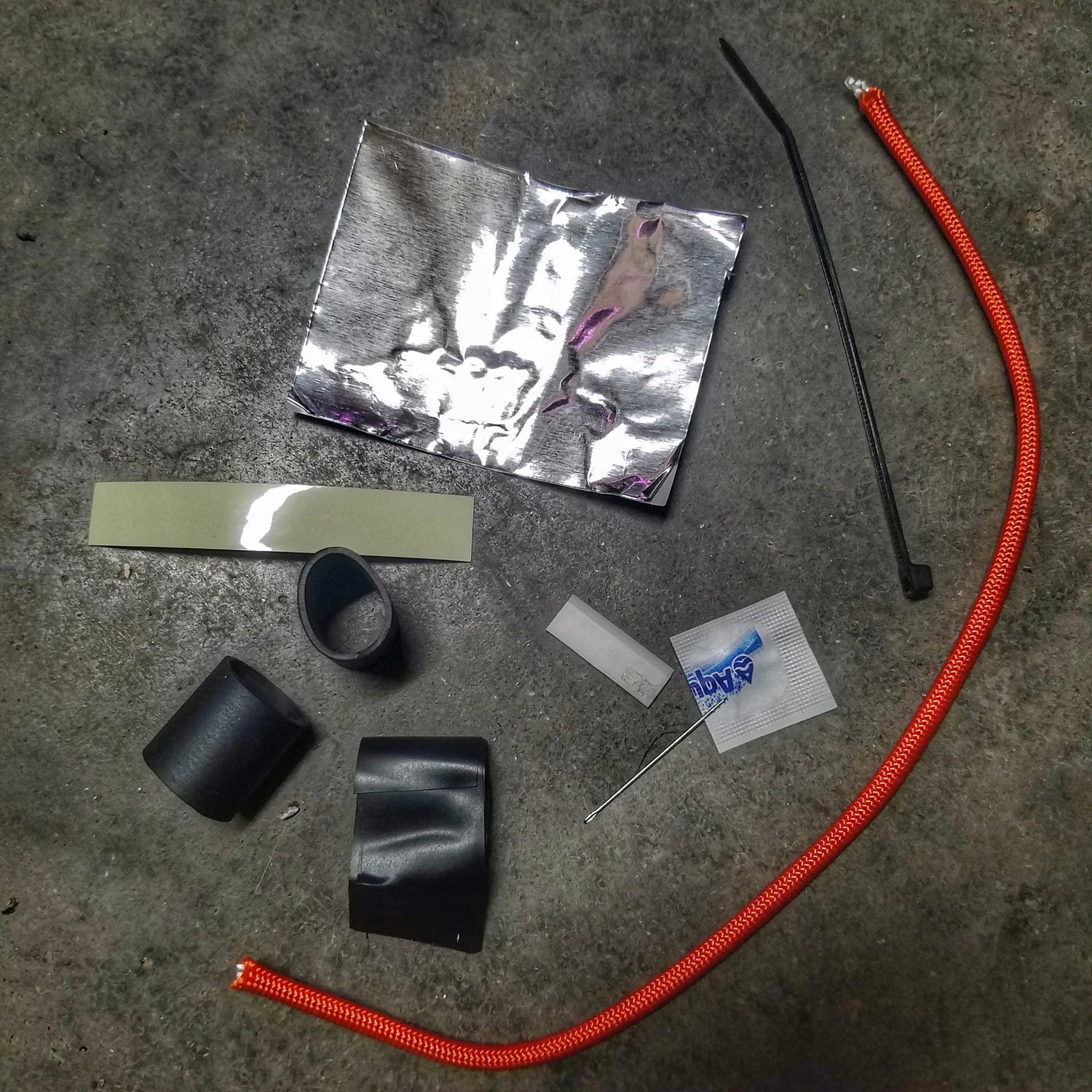 Survival Kit Lighter - Fire Starter outfitted with supplies. Superesse Straps LLC