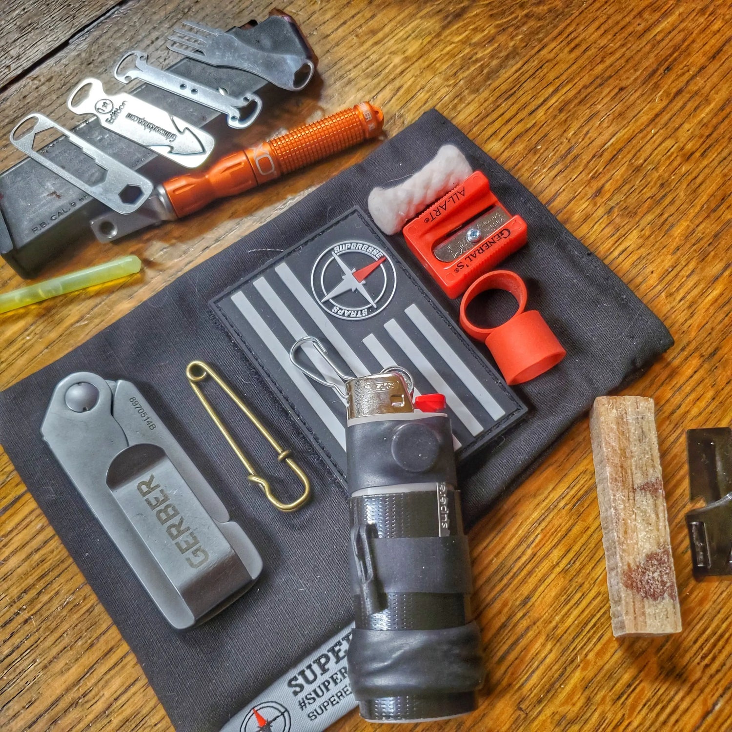 Survival Kit Lighter - Fire Starter outfitted with supplies. Superesse Straps LLC