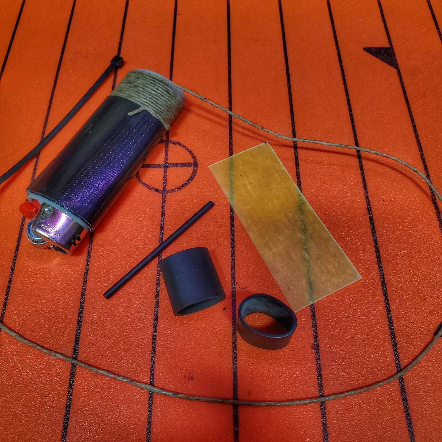 Survival Kit Lighter - Fire Starter outfitted with supplies. Superesse Straps LLC