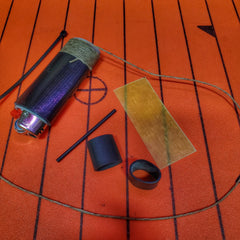 Survival Kit Lighter - Fire Starter outfitted with supplies. Superesse Straps LLC