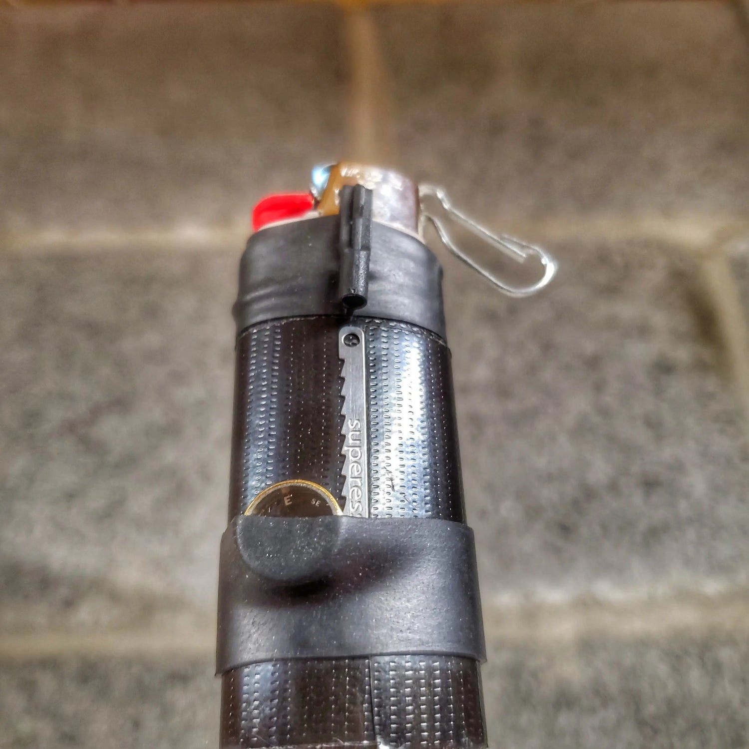 Survival Kit Lighter - Fire Starter outfitted with supplies. Superesse Straps LLC