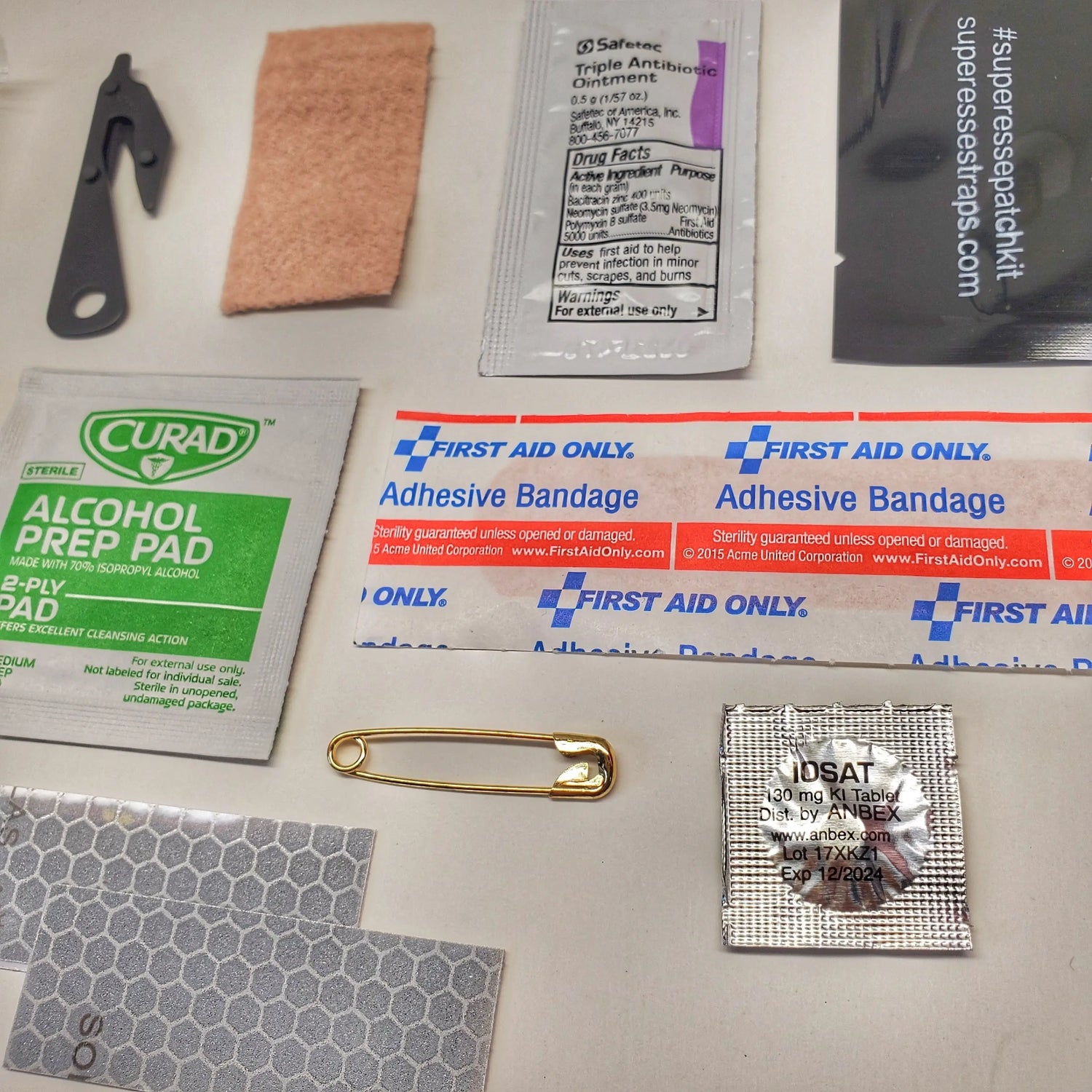 Rescue Patch Kit: emergency tools and last resort first-aid Superesse Straps LLC