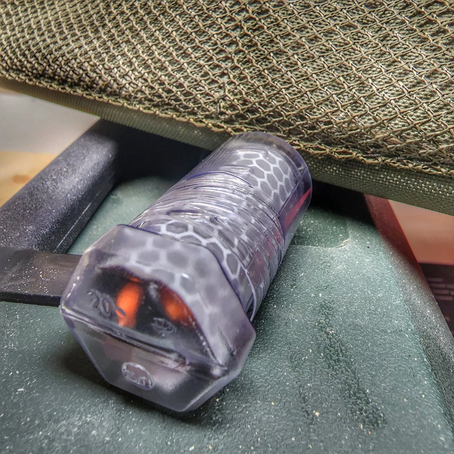 Drop Shell - Polymer Capsule filled with Survival, Escape, and First-Aid Supplies. Superesse Straps LLC