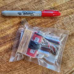 Survival Kit Lighter - Fire Starter outfitted with supplies. Superesse Straps LLC