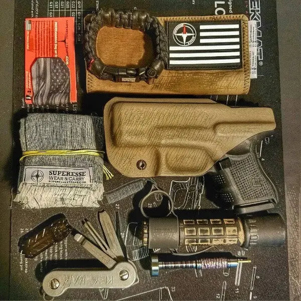 Saw Shemagh: Firestarter sewn button, built-in Kevlar Utility Saw, Fire Tinder border. Superesse Straps LLC